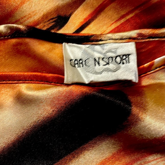 Caren Sports Women’s Elegant Black and Brown Blouse with Sophisticated Style - Picture 7 of 9